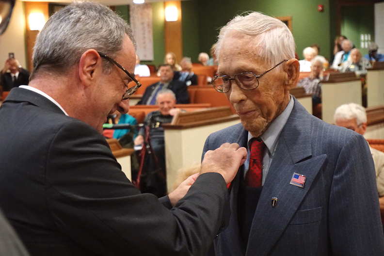 French Consul General Louis de Corail awarding the Legion of Honor to Paul Willis, 83 INFD 329 REG CO G.