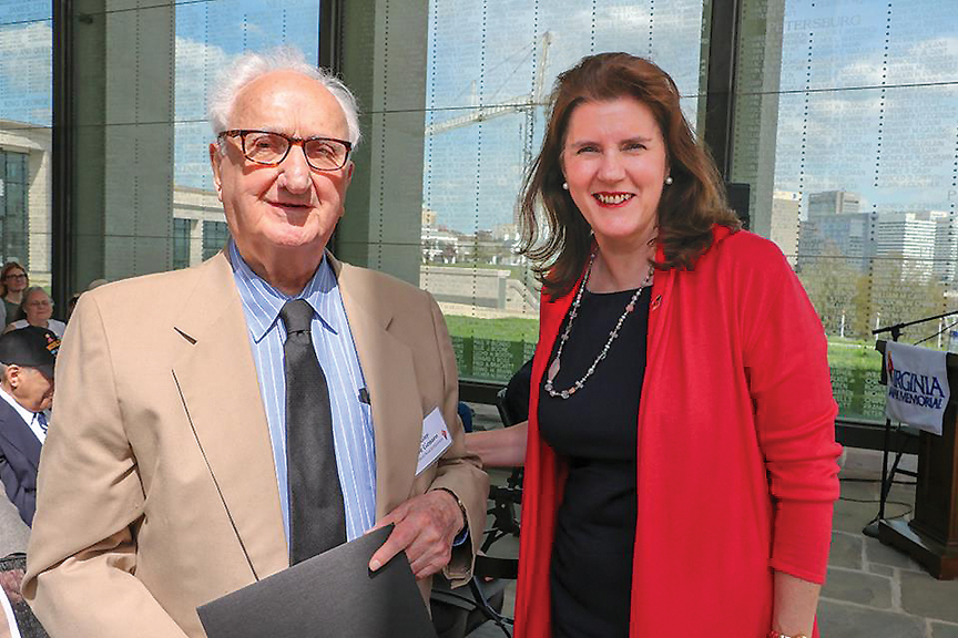 Sylvie Lucas (right), Luxembourg Ambassador to the United States, at the Virginia War Memorial in April 2018 with Guy DeGenaro, Professor Emeritus, Virginia Commonwealth University School of Business. Dr. DeGenaro was a glider pilot who participated in the D-Day invasion.